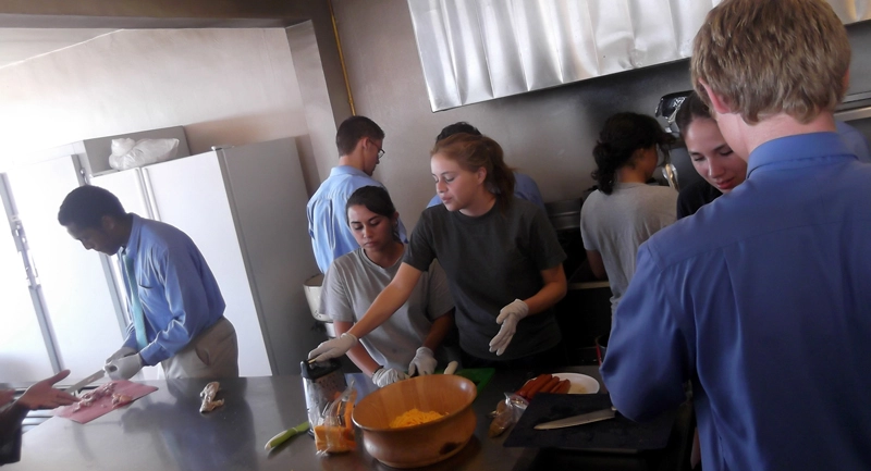 teens-working-as-a-team-at-the-kitchen